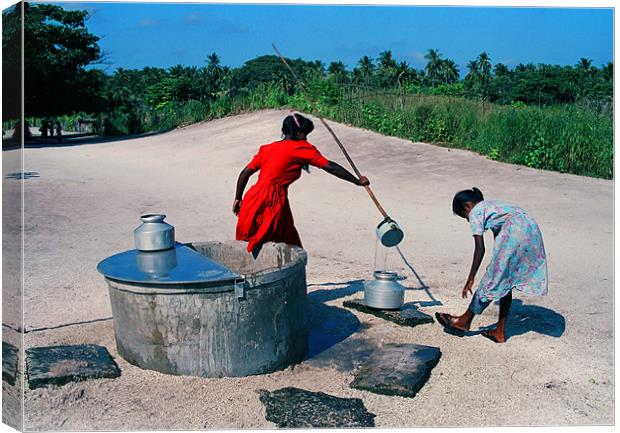 filling water Canvas Print by Hassan Najmy