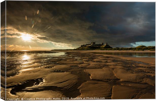 Bamburgh Castle Coastal Lanbdscape Canvas Print by Creative Photography Wales