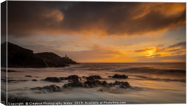 Mumbles Lighthouse from Bracelet Bay Canvas Print by Creative Photography Wales