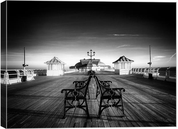 Promenading Cromer Pier Canvas Print by Marcus Scott