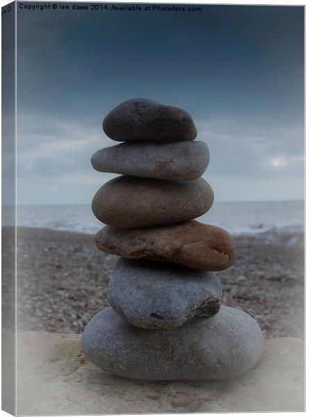  pebble tower Canvas Print by Images of Devon