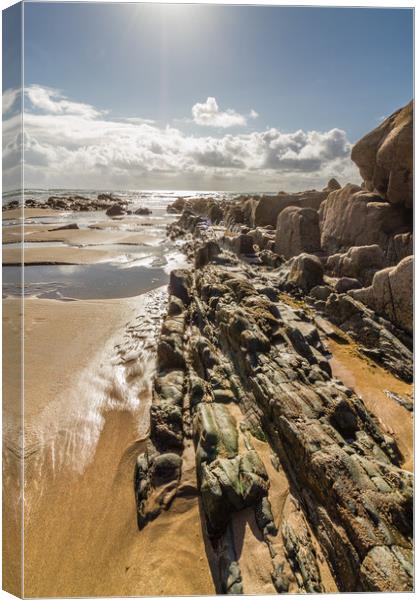 Rock, sand and sea Canvas Print by Images of Devon