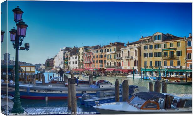 Moored on a Venice canal Canvas Print by Angela Wallace