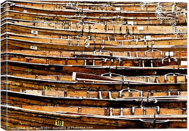 Old Wooden Rowing Boats Moored Canvas Print by Rick Parrott