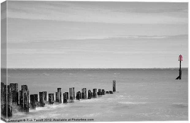 Breakwater Splash Canvas Print by Rick Parrott