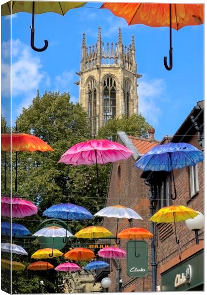 Umbrella Street Coppergate York Canvas Print by Derek Beattie