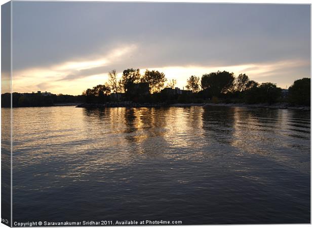 Sunset and wavy water Canvas Print by Saravanakumar Sridhar