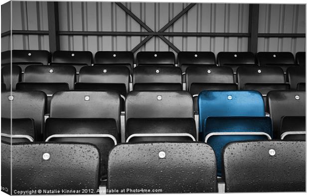 Blue Seat in the Football Stand Canvas Print by Natalie Kinnear