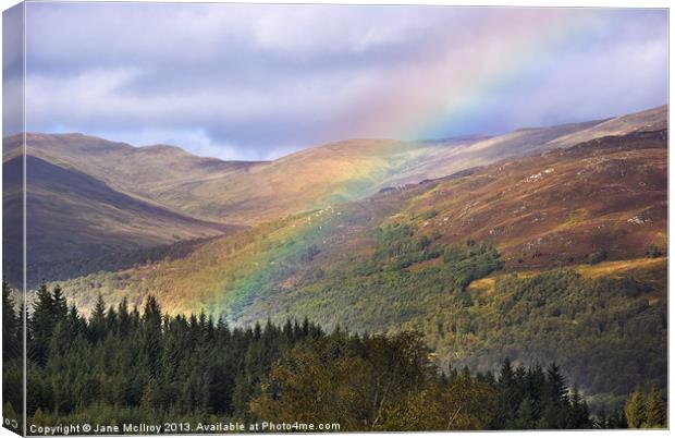 Rainbow in the Trossachs Canvas Print by Jane McIlroy