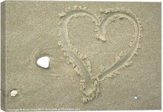 Love in the sand Canvas Print by Nicky Vines