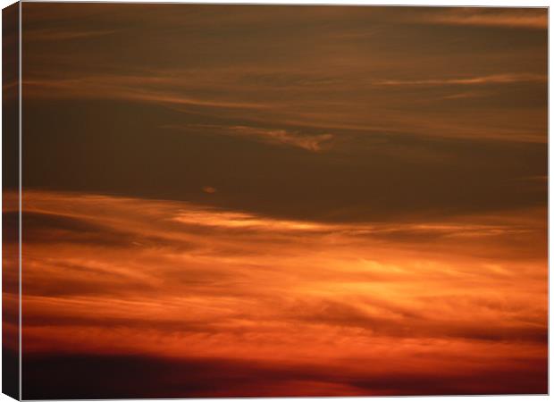 sunset clouds Canvas Print by nigel watson