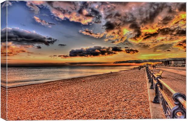 Sunset along the beach Canvas Print by Dean Messenger