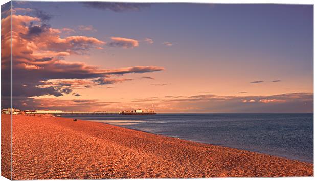 Sunset over Brighton Pier Canvas Print by Dean Messenger