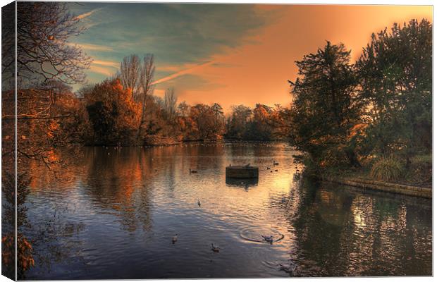 Autumn evening over the lake Canvas Print by Dean Messenger