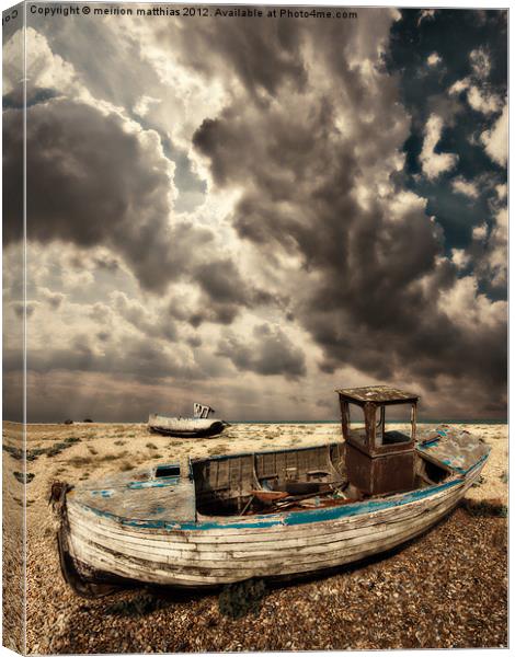 dreamy wrecked wooden fishing boats Canvas Print by meirion matthias