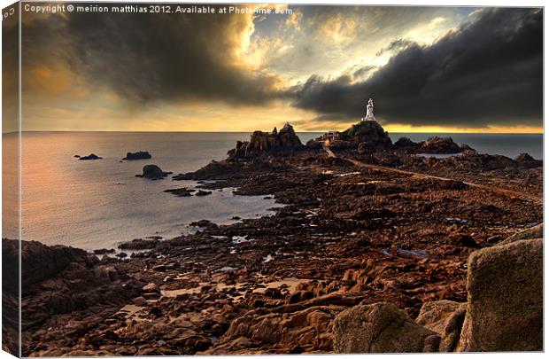 moody at La Corbiere lighthouse Canvas Print by meirion matthias