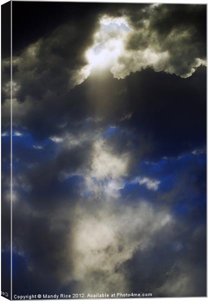 Rays through storm clouds Canvas Print by Mandy Rice
