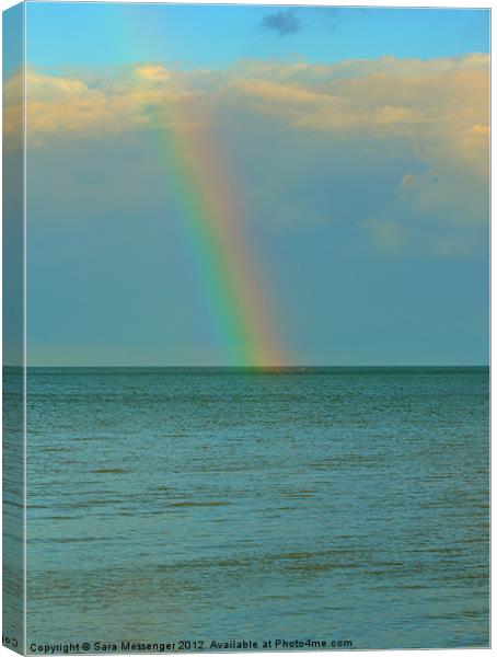 Rainbow at sea Canvas Print by Sara Messenger