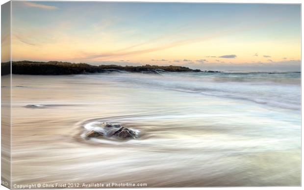 At the Foot of Bamburgh Castle Canvas Print by Chris Frost