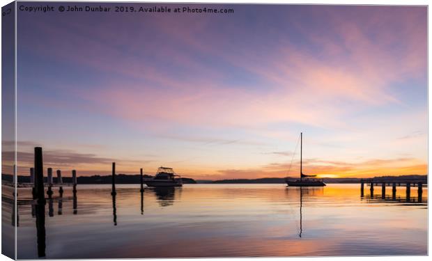Sunrise on Lake Macquarie Canvas Print by John Dunbar