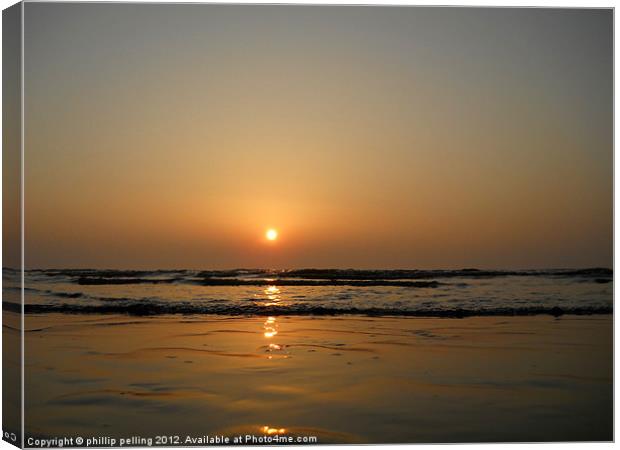Sunrise at the beach. Canvas Print by camera man