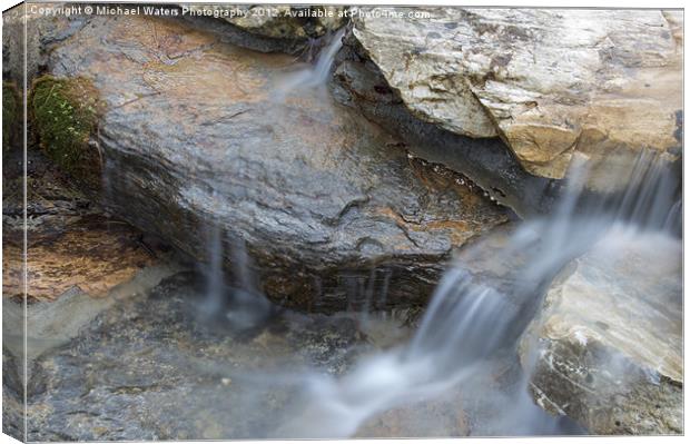 Flowing Waters Canvas Print by Michael Waters Photography