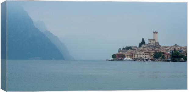 Malcesine in the mist Canvas Print by Julian Bowdidge