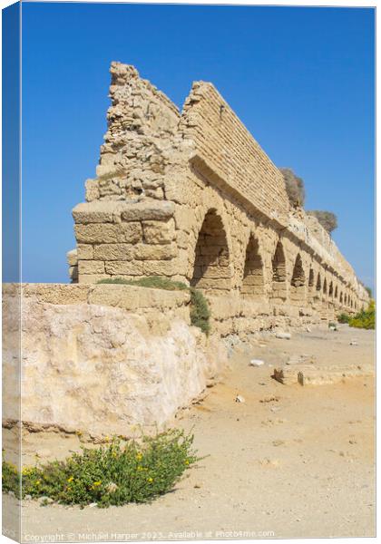 A section of the magnificent ancient Roman aquaduct, where it cr Canvas Print by Michael Harper