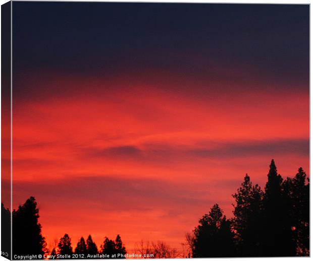 Red Sky over Montana Canvas Print by Larry Stolle