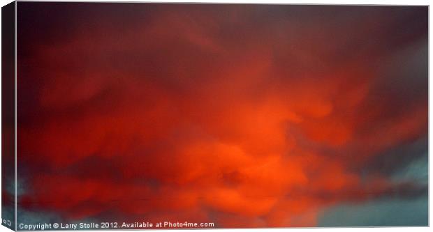 Red Cloud Canvas Print by Larry Stolle