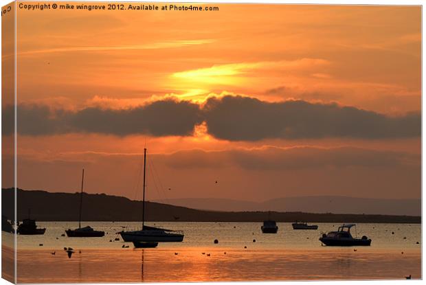 Mudeford Quay Sunset Canvas Print by mike wingrove