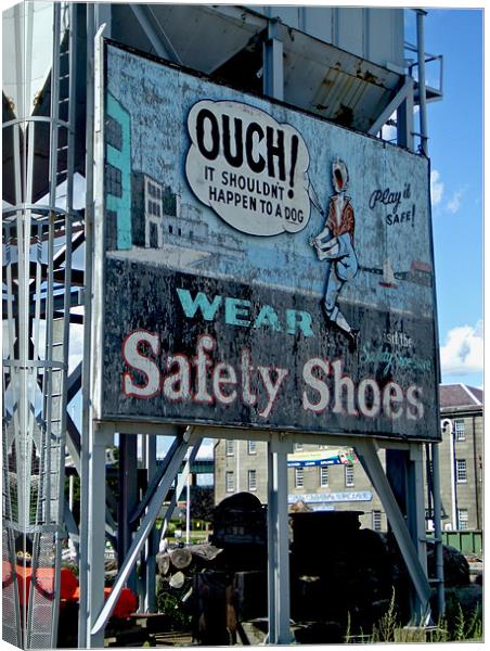 Ouch Safety Shoes Canvas Print by Mark Sellers