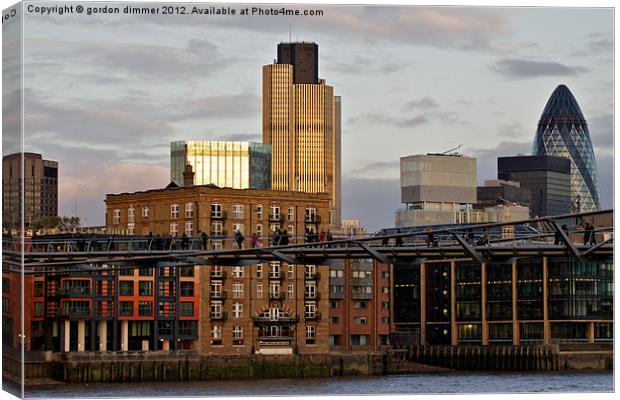 The city of London in the early evening sun Canvas Print by Gordon Dimmer