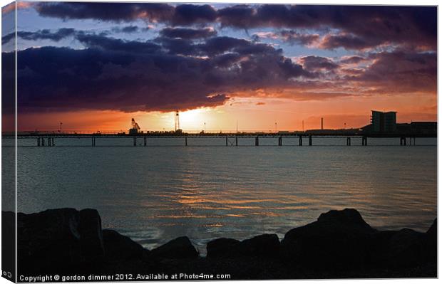Sunrise over Fawley Canvas Print by Gordon Dimmer