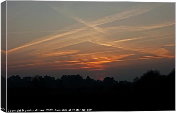 Contrails over New Forest Canvas Print by Gordon Dimmer