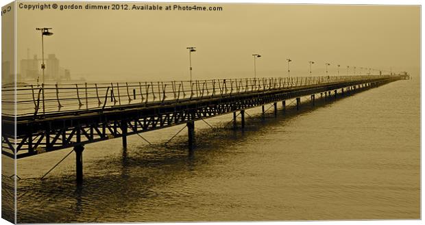 An Historic Pier at Hythe Canvas Print by Gordon Dimmer