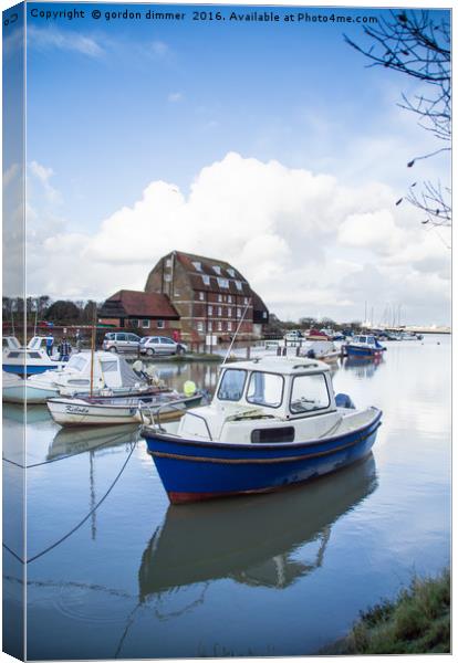 Small Boat at Ashlett Creek in Hampshire Canvas Print by Gordon Dimmer