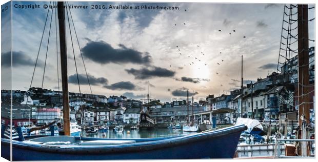 The Sun going down at Brixham Harbour Canvas Print by Gordon Dimmer