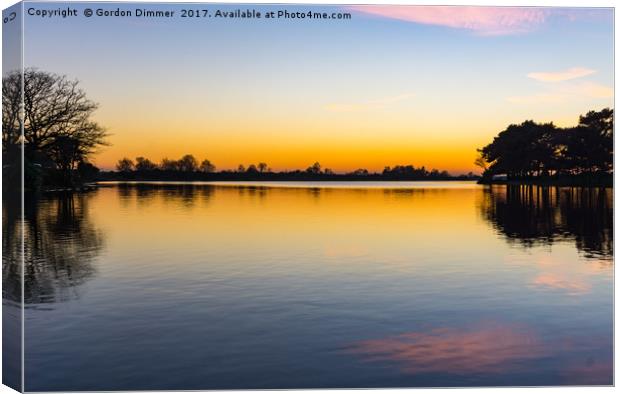 Orange Glow Over Hatchet Pond Canvas Print by Gordon Dimmer