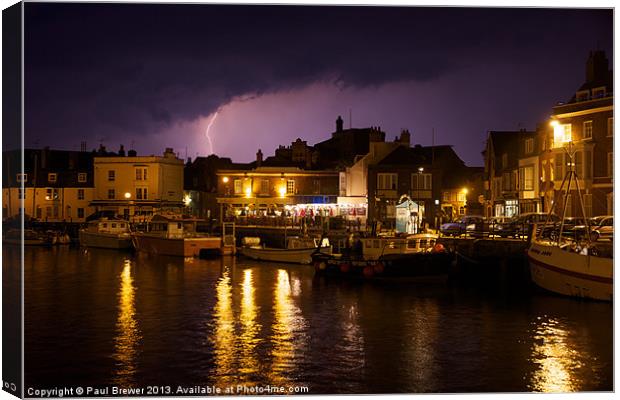 Lighting Across Weymouth Harbour Canvas Print by Paul Brewer