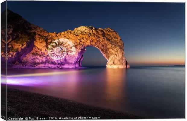 Durdle Door at Night with Illumination Canvas Print by Paul Brewer