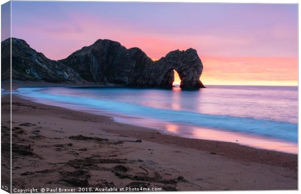 Durdle Door at Sunrise Canvas Print by Paul Brewer
