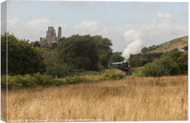 Steam Train Leaves Corfe Castle Station Canvas Print by Paul Brewer
