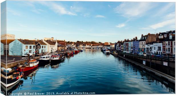 Weymouth Harbour at sunset Canvas Print by Paul Brewer