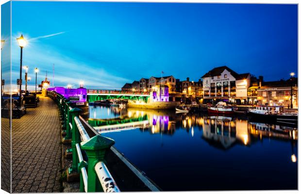 Weymouth Harbour Bridge at Night Canvas Print by Paul Brewer