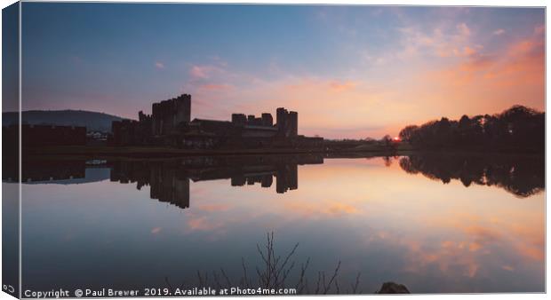 Caerphilly Castle just after sunset Canvas Print by Paul Brewer