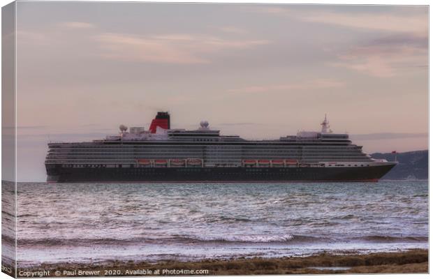 Cunard Queen Elizabeth moored off the Coast of Dor Canvas Print by Paul Brewer