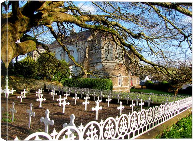 Garden and graveyard of the St. Marys church in Di Canvas Print by barbara walsh