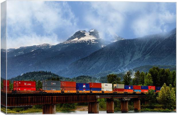 Freight Train in the Rocky Mountains Canvas Print by Elaine Manley