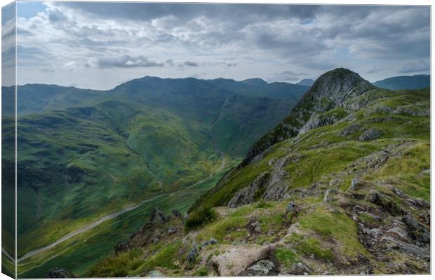 View of Pike o' Stickle and Crinkle Crags Canvas Print by Greg Marshall